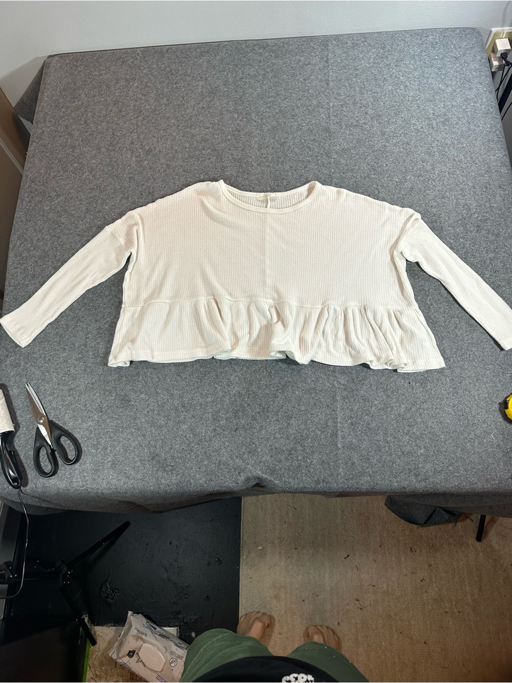 Final Touch Cream Ruffle-Hem Ribbed Top